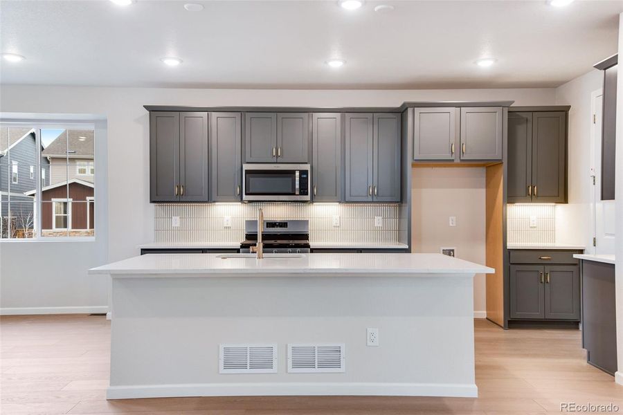 Furnished interior view inside a new home in Painted Prairie, Aurora (Image 7).