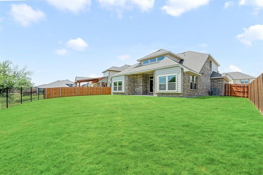 Exterior details and patio area of a home in Glenwood Meadows, Lantana (Image 22). Exterior details and patio area of a home in Glenwood Meadows, Lantana (Image 22).