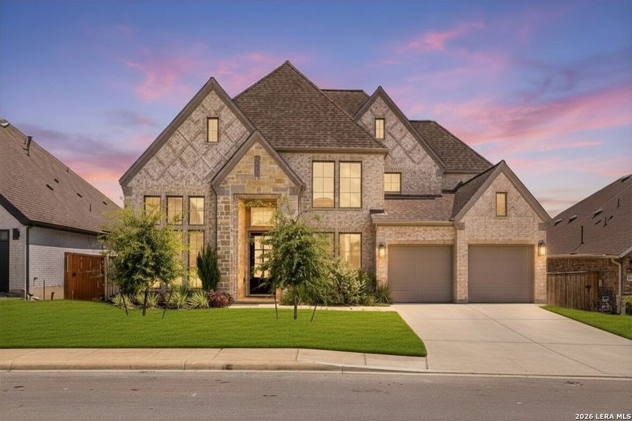 Front exterior of a new home in Ladera, San Antonio, TX, highlighting curb appeal (Image 2). Front exterior of a new home in Ladera, San Antonio, TX, highlighting curb appeal (Image 2).