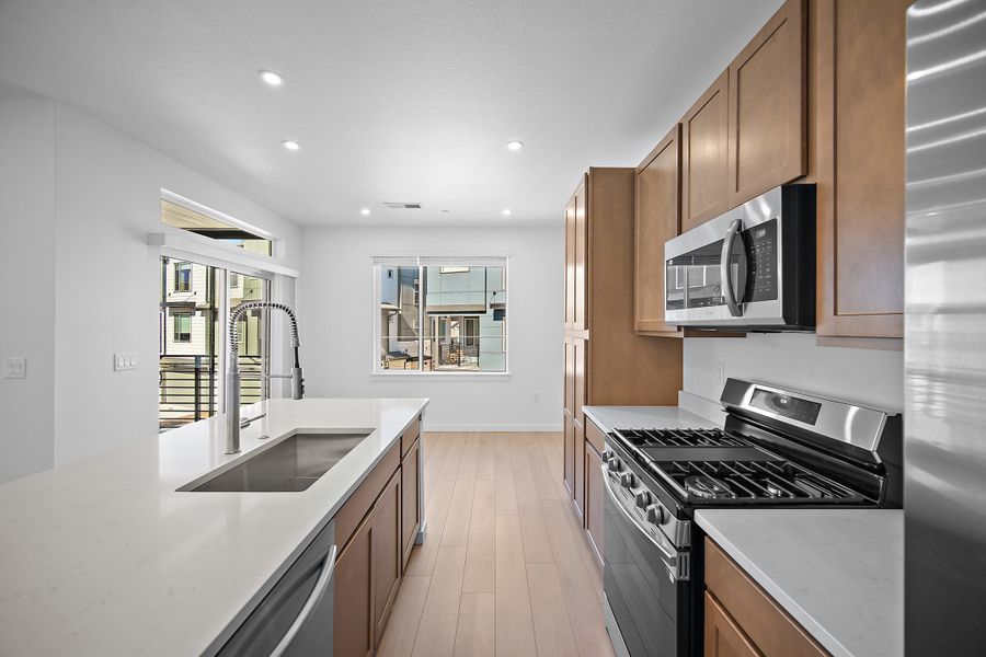 Furnished interior view inside a new home in Lyric at RidgeGate Townhomes, Lone Tree (Image 5).