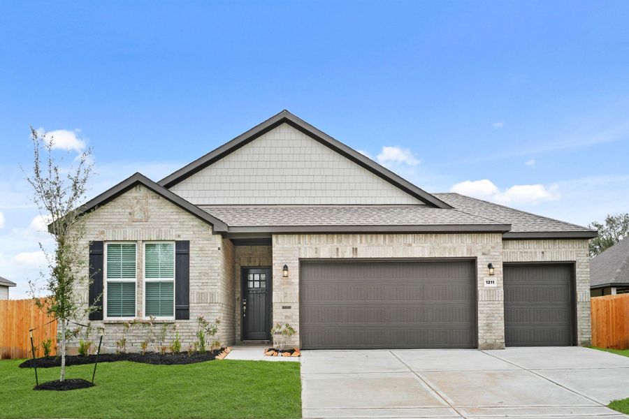 Front exterior of a new home in Valor Park, Bay City, TX, highlighting curb appeal (Image 17). Front exterior of a new home in Valor Park, Bay City, TX, highlighting curb appeal (Image 17).