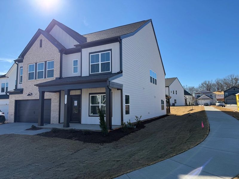 Exterior  - Earthy and warm tones feel rooted in place.