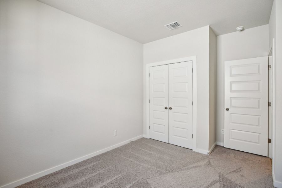 A room with white doors.