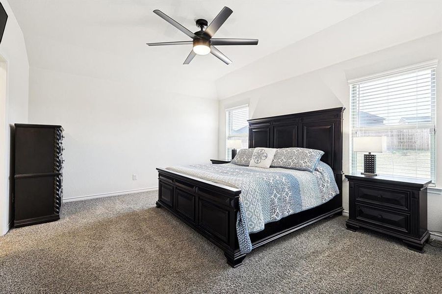 Bedroom with carpet floors and ceiling fan