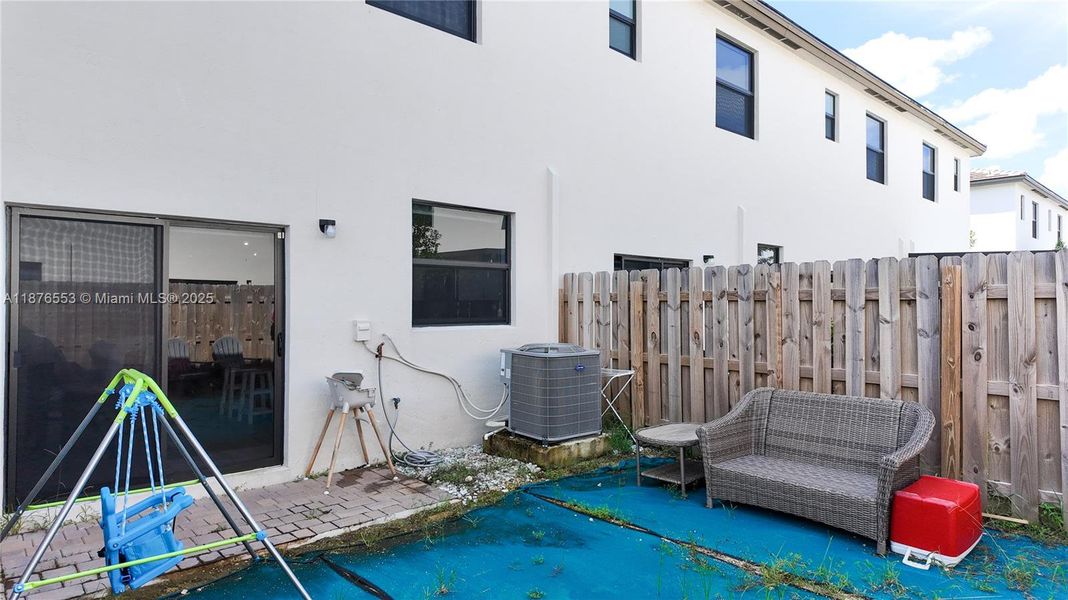 Front exterior of a new home in , Homestead, FL, highlighting curb appeal (Image 1). Front exterior of a new home in , Homestead, FL, highlighting curb appeal (Image 1).