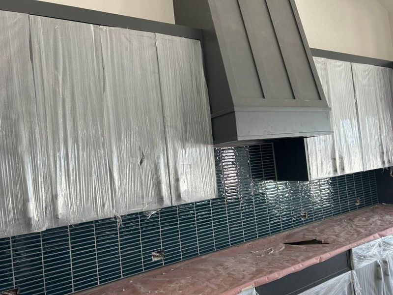 Detailed view of custom range hood