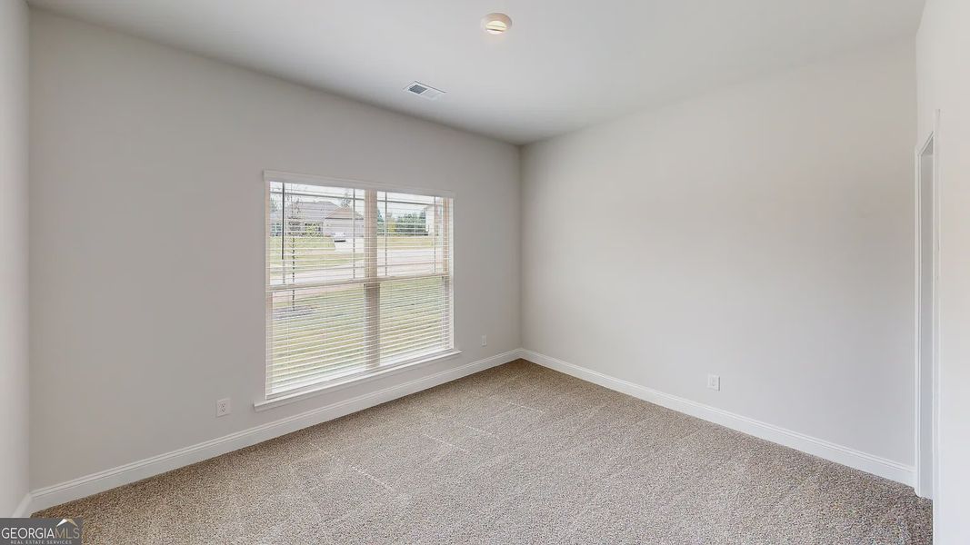 Spacious, unfurnished interior of a new home in Holliday Pass, Griffin (Image 28).