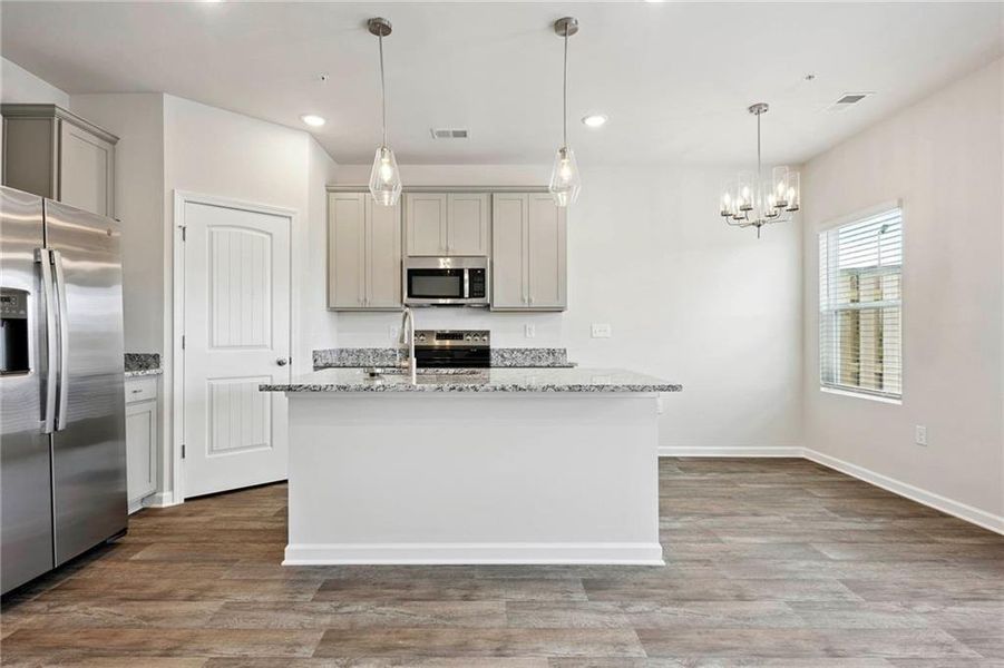 Furnished interior view inside a new home in The Enclave Townhomes, Hampton (Image 7).
