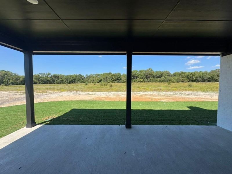 Exterior details and patio area of a home in King Crossing Estates, Van Alstyne (Image 11). Exterior details and patio area of a home in King Crossing Estates, Van Alstyne (Image 11).