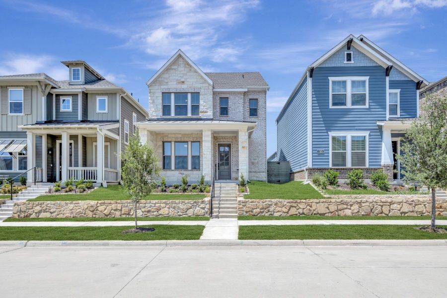 Front exterior of a new home in The Retreat at Harvest, Argyle, TX, highlighting curb appeal (Image 2). Front exterior of a new home in The Retreat at Harvest, Argyle, TX, highlighting curb appeal (Image 2).