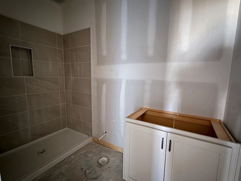 Guest Bath featuring the AW Collection® Artisan - A down-to-earth mix of texture and function.