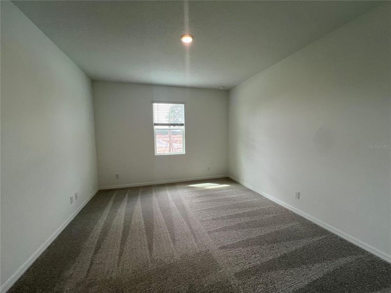 Spacious, unfurnished interior of a new home in Trinity Gardens, Deland (Image 13).