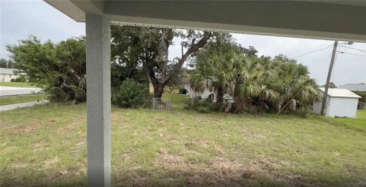 Exterior details and patio area of a home in , Port Charlotte (Image 4). Exterior details and patio area of a home in , Port Charlotte (Image 4).
