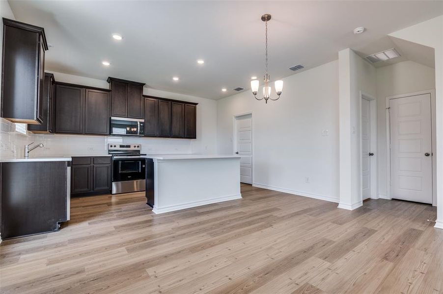 Furnished interior view inside a new home in Cottonwood Creek, Seagoville (Image 7).