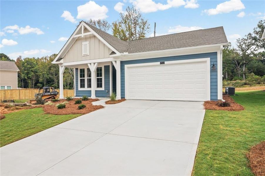 Front exterior of a new home in Sage Woods, Dallas, GA, highlighting curb appeal (Image 18).