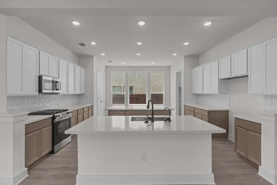 Representative furnished interior of a home built from the Maddie by Chesmar Homes in Stillwater Ranch, San Antonio (Image 3).