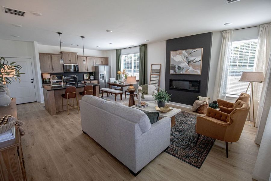 Representative furnished interior of a home built from the Provost by Grant & Co in The Townhomes at Union Depot, Bartlett (Image 13).