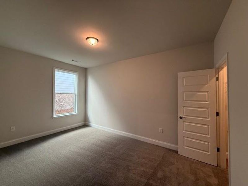 Spacious, unfurnished interior of a new home in Cooper's Walk, Loganville (Image 26).