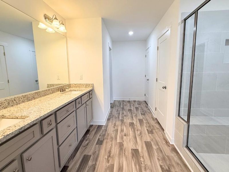 Furnished interior view inside a new home in Sutton's Landing, Statham (Image 6).