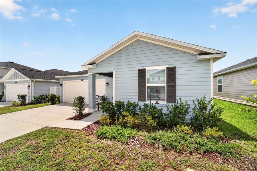 Front exterior of a new home in Marion Ranch, Ocala, FL, highlighting curb appeal (Image 2). Front exterior of a new home in Marion Ranch, Ocala, FL, highlighting curb appeal (Image 2).