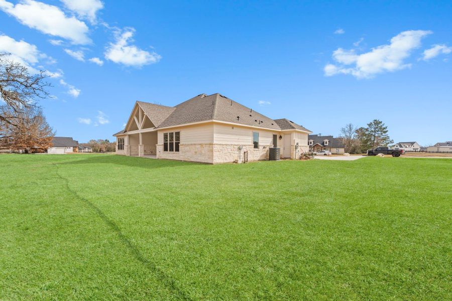 Exterior details and patio area of a home in Chapel Bend, Montgomery (Image 20).