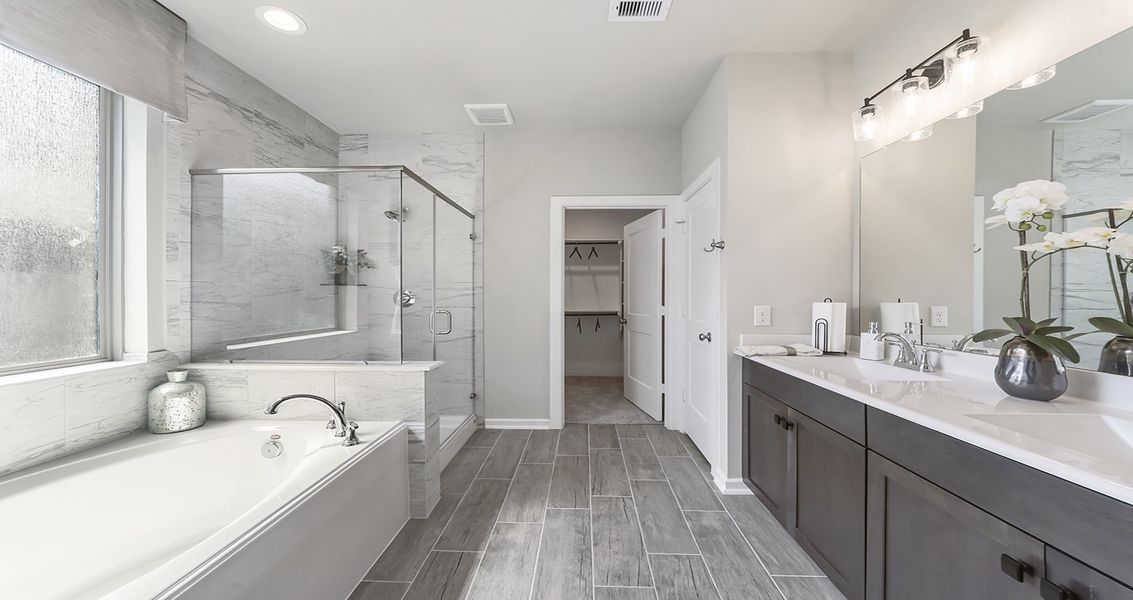 Furnished interior view inside a new home in Wood Leaf Reserve, Tomball (Image 11).