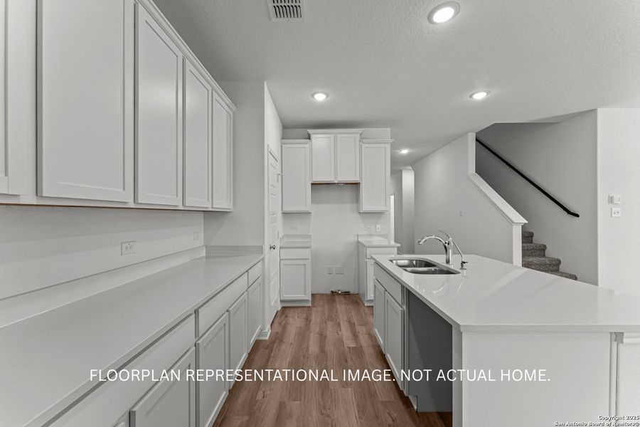 Furnished interior view inside a new home in Agave, San Antonio (Image 8).