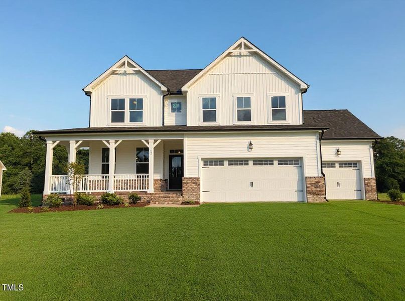 Front exterior of a new home in Tobacco Road, Angier, NC, highlighting curb appeal (Image 96). Front exterior of a new home in Tobacco Road, Angier, NC, highlighting curb appeal (Image 96).