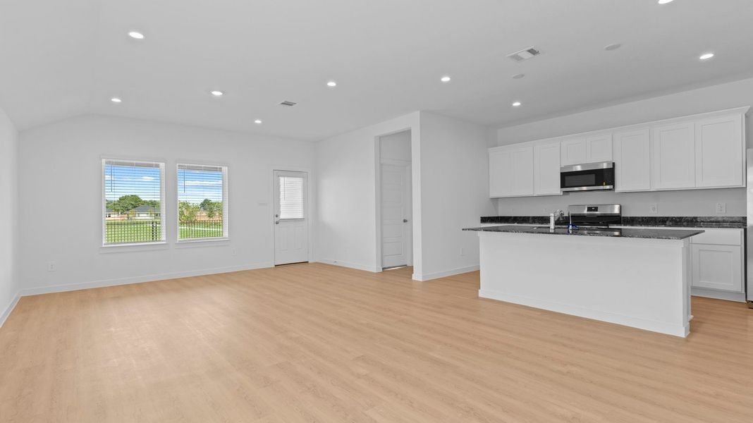 Representative unfurnished interior of a home built from the Caden by D.R. Horton in Caldwell Crossing, Iowa Colony (Image 15).