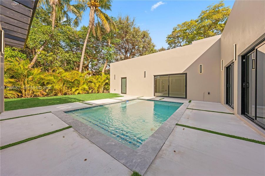 Exterior details and patio area of a home in , North Miami (Image 3).