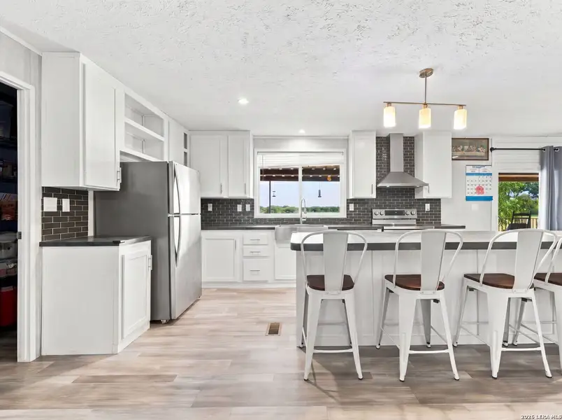 Furnished interior view inside a new home in , Devine (Image 9).