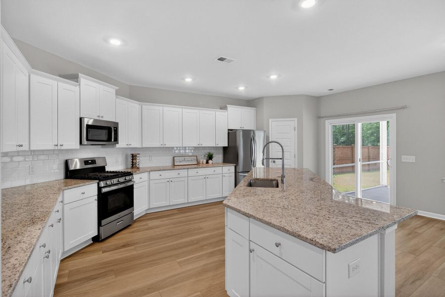 Furnished interior view inside a new home in Lindera Preserve at Cane Bay Plantation, Summerville (Image 14).