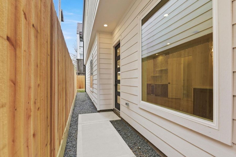 Exterior details and patio area of a home in , Houston (Image 4).