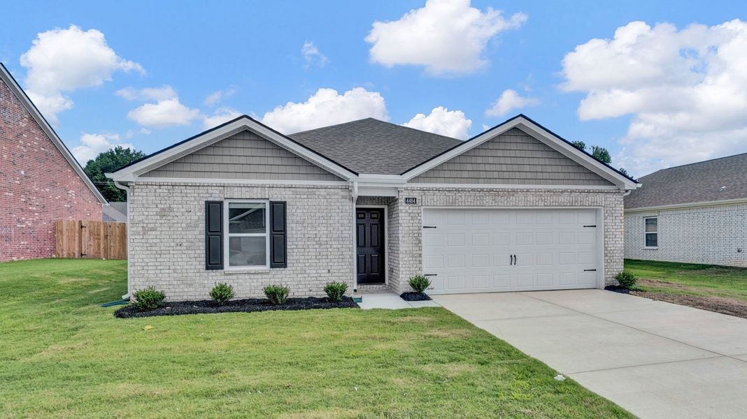 Front exterior of a new home in Huntington Estates, Millington, TN, highlighting curb appeal (Image 2).