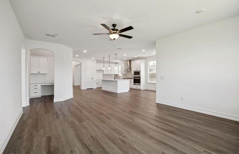 Expansive gathering room bathed in natural sunlight *Real home pictured Expansive gathering room bathed in natural sunlight *Real home pictured