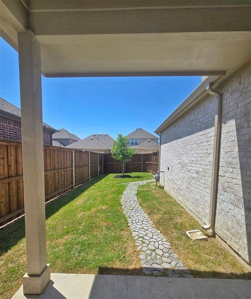 View of yard featuring a fenced backyard