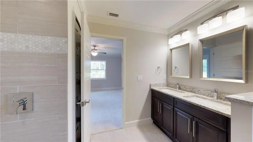 Furnished interior view inside a new home in , North Port (Image 11).