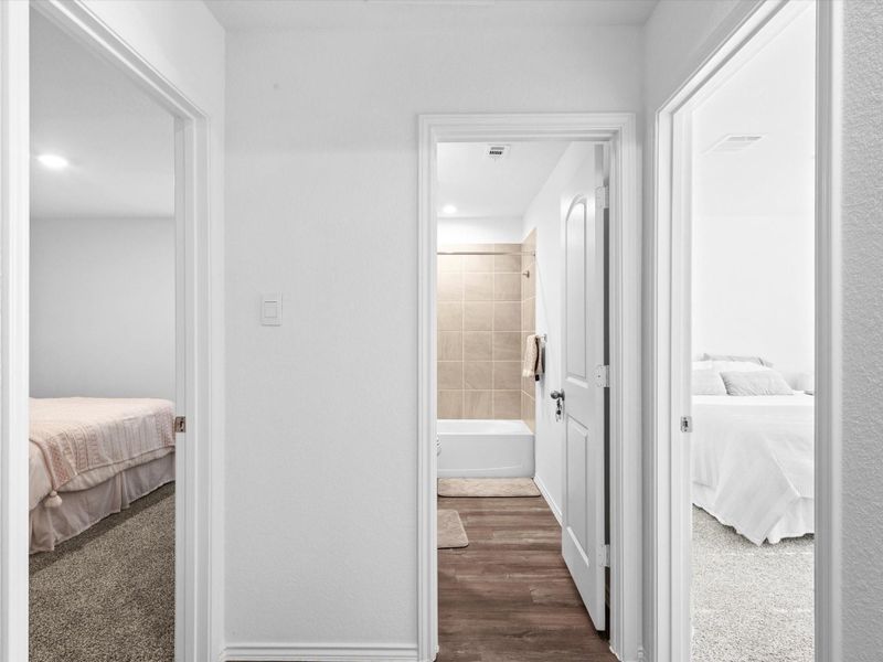 Secondary Bathroom is located between Bedroom 2 and Bedroom 3.