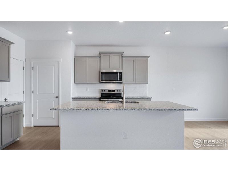 Furnished interior view inside a new home in Vista Meadows, Fort Lupton (Image 8).
