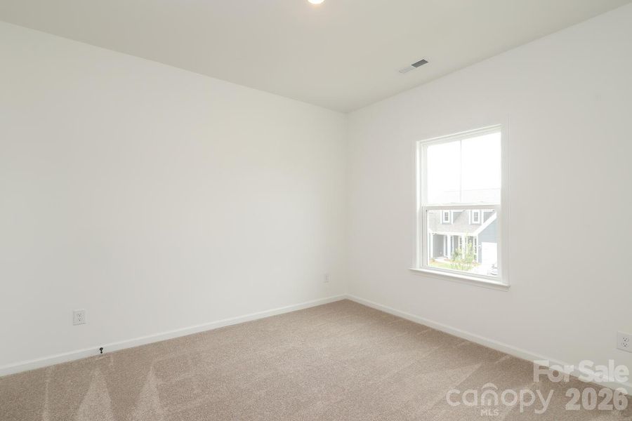 Spacious, unfurnished interior of a new home in Estates at Sugar Creek, Indian Land (Image 41).