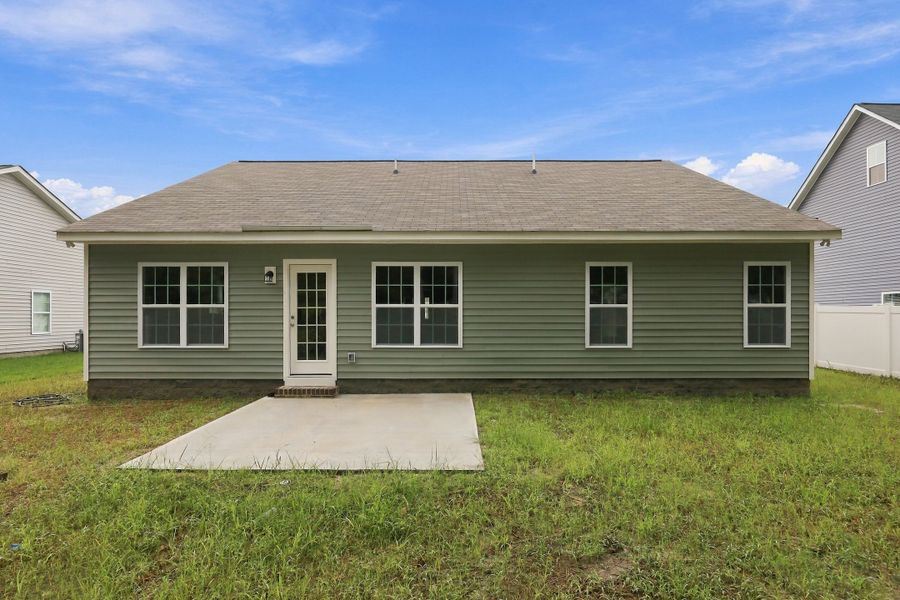 Exterior details and patio area of a home in Davenport Farms, Winterville (Image 4).