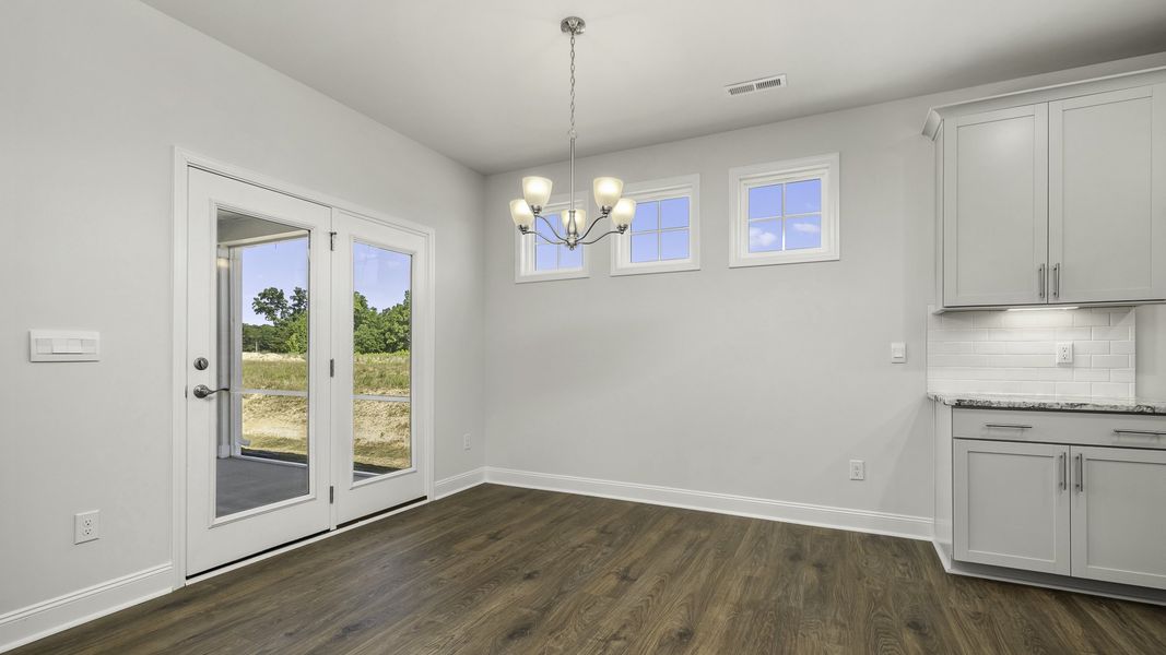Spacious, unfurnished interior of a new home in The Villas at Kinsley, Jamestown (Image 14).