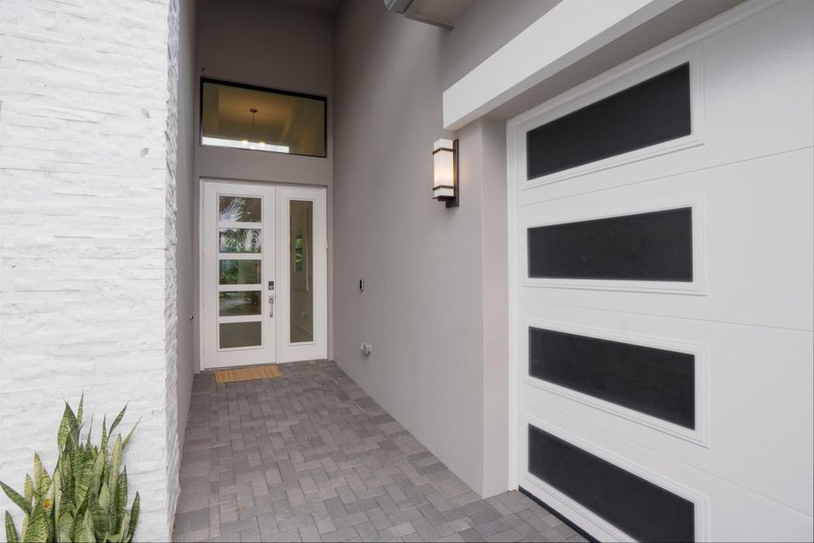 Exterior details and patio area of a home in Lotus Edge, Boca Raton (Image 21). Exterior details and patio area of a home in Lotus Edge, Boca Raton (Image 21).