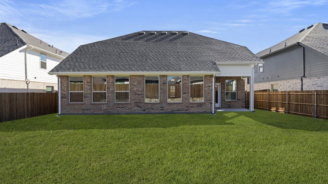 Exterior details and patio area of a home in Keeneland, Aubrey (Image 23). Exterior details and patio area of a home in Keeneland, Aubrey (Image 23).