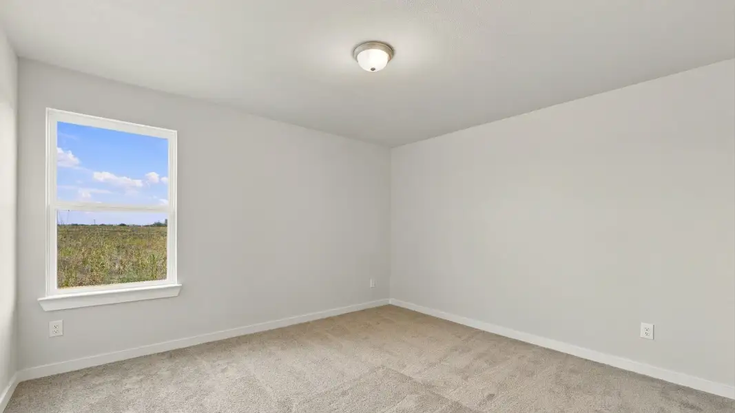 Furnished interior view inside a new home in Carillon, Manor (Image 11).