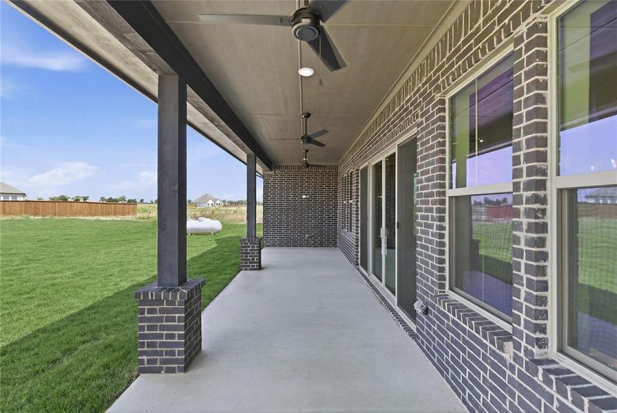 Exterior details and patio area of a home in , New Fairview (Image 4).