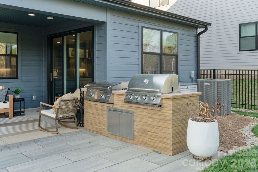Exterior details and patio area of a home in Amara Chase, Huntersville (Image 4).