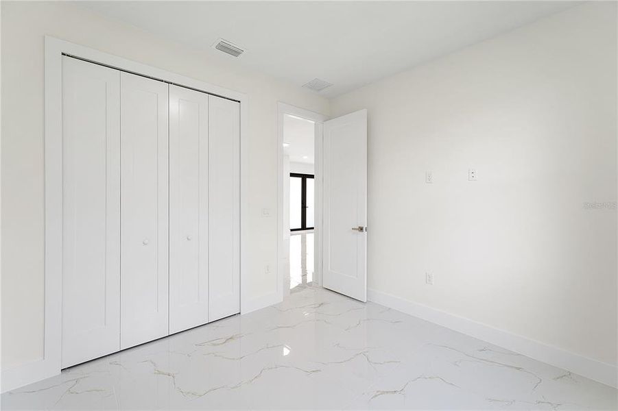 Spacious, unfurnished interior of a new home in , Port Charlotte (Image 14).