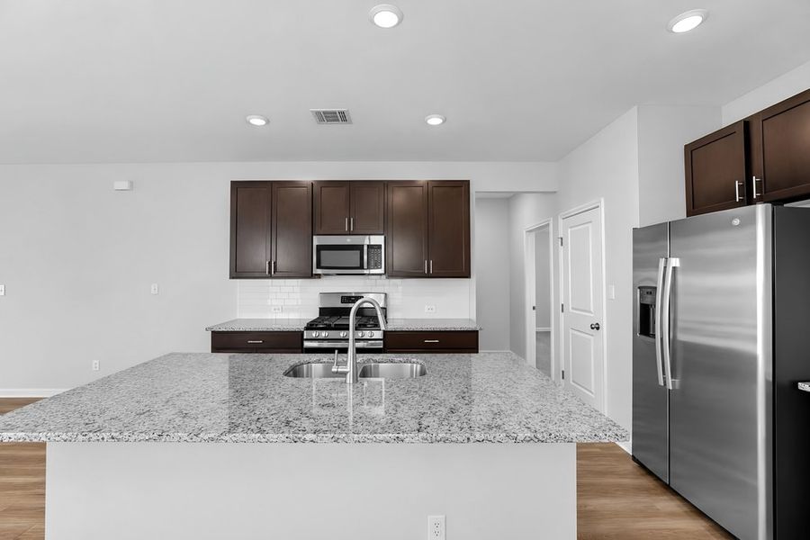 Furnished interior view inside a new home in Sunfield, Buda (Image 6).