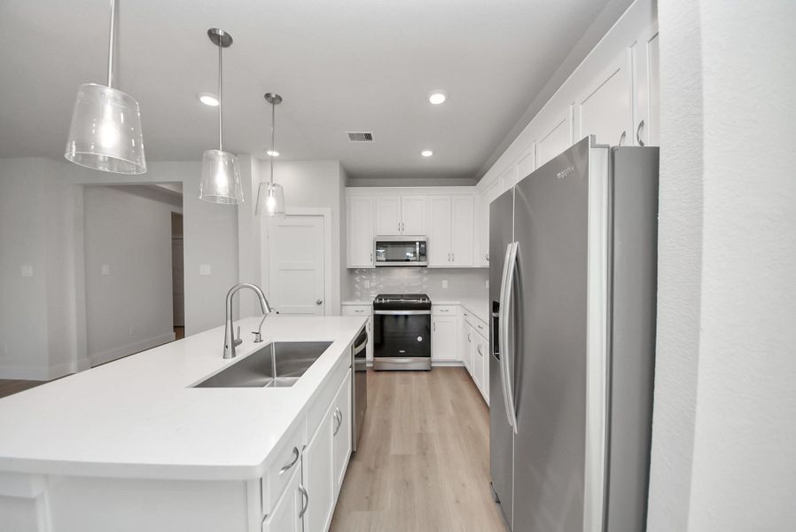 Furnished interior view inside a new home in Sunrise Cove: Landmark Collection, Texas City (Image 12).